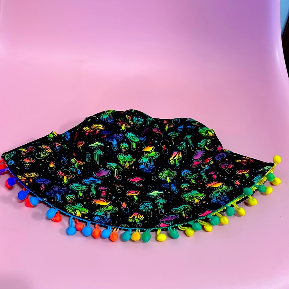 Rainbow mushroom bucket hat with custom fuzzy balls around brim